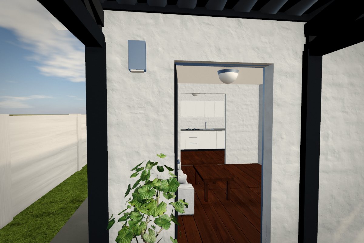 Entrada de una casa prefabricada vista desde la galería: living con piso de madera, mesa y sillón, y la cocina al fondo, en el modo Recorrer del configurador 3D